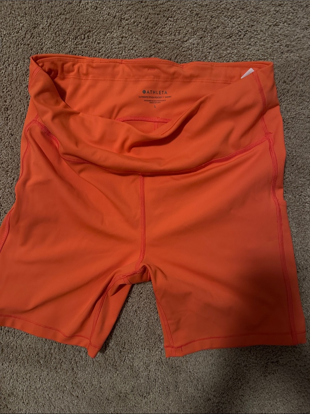 Athleta Bright Orange High-Rise Bike Shorts